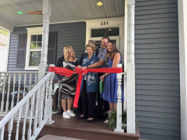 East Lansing family celebrates roof solar panels made possible by Inflation Reduction Act
