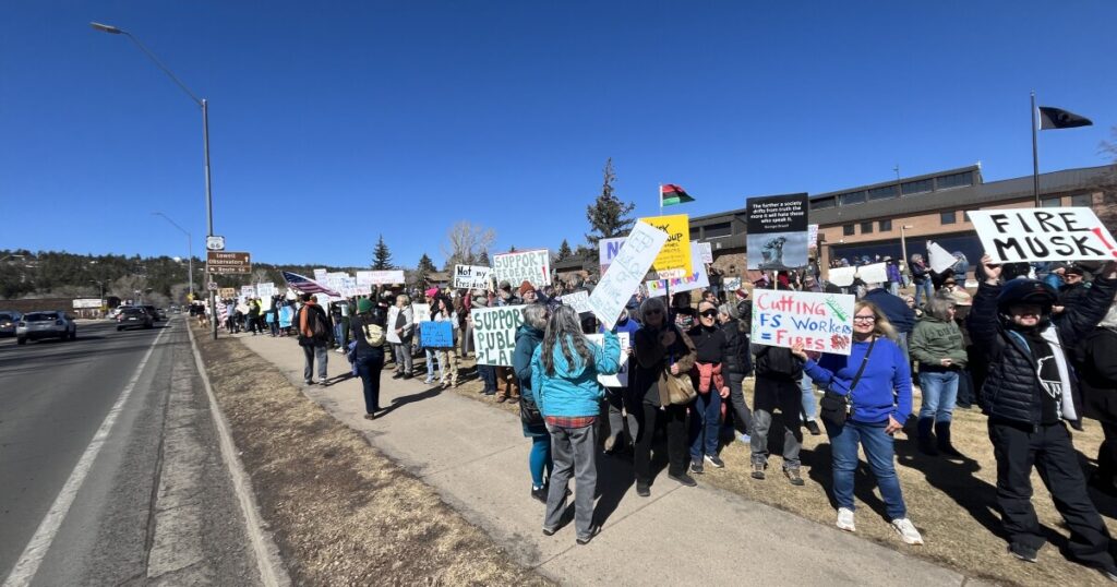 Hundreds rally in Flagstaff as Trump admin directs layoffs at federal agencies