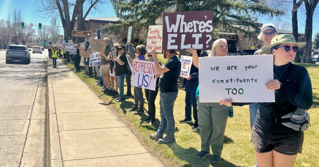 Frustrated by federal cuts, protesters call on Rep. Eli Crane to hold public town hall