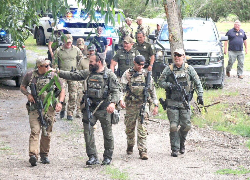 Law enforcement in uniform.