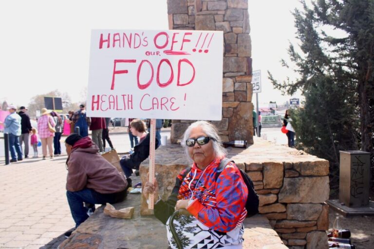 Lucy Suppah, a member of the Confederated Tribes of Warm Springs, attends a protest in Madras on Saturday, April 5, 2025. (Photo by Julia Shumway/Oregon Capital Chronicle)
