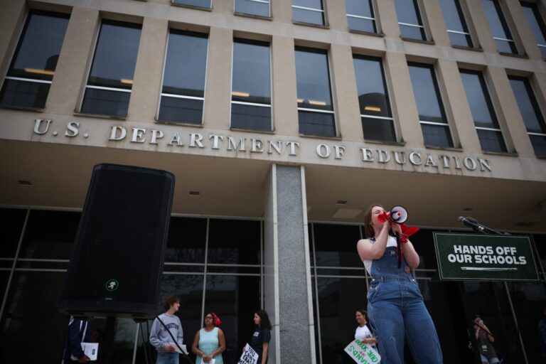Student protesters shout during a “Hands Off Our Schools” rally in front of the U.S. Department of Education building in Washington, D.C., in April. The same group held a virtual press conference Tuesday to protest President Donald Trump’s efforts to dismantle the U.S. Department of Education. (Photo by Kayla Bartkowski/Getty Images)