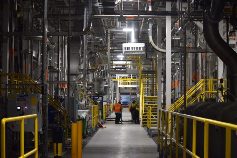 Construction workers install finishing touches at a Scout Motors electric vehicle assembly plant in Blythewood, S.C., in February. Health care and construction hiring helped boost January jobs, but downward revisions for the whole of 2025 marked the lowest increase in U.S. jobs outside a recession since 2003. (Photo by Jessica Holdman/SC Daily Gazette)