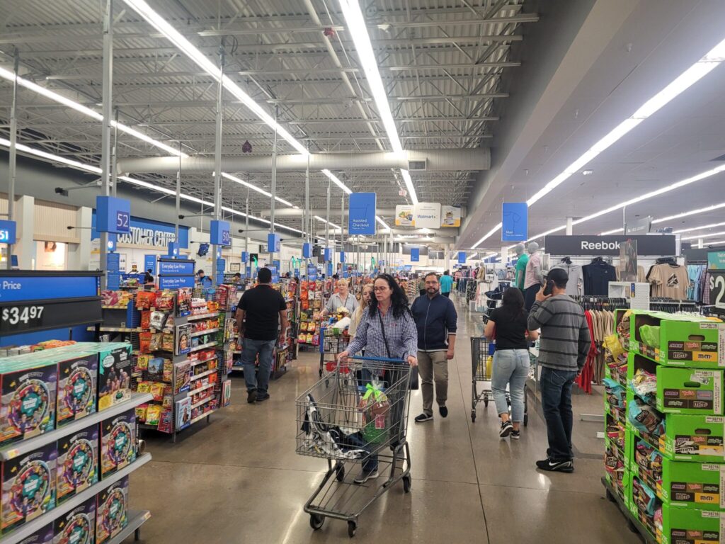 People shop for groceries at a Walmart store in Ohio. New research suggests SNAP work requirements won’t enhance employment and will push more people off of food assistance. (Photo by Marty Schladen/Ohio Capital Journal)