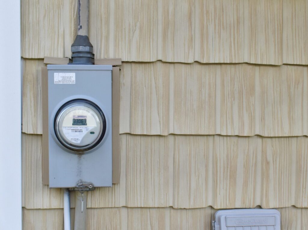 After facing costly heating bills this winter, a new report says consumers shouldn’t expect relief for the summer months, as electric prices and temperatures continue to rise. (Photo by Dave Cummings/New Hampshire Bulletin)