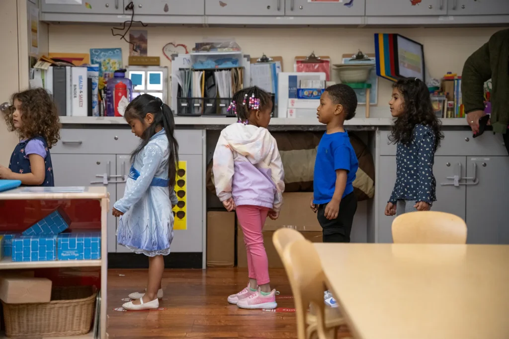Trump Administration Plans to Slash Key Head Start Program Standards - Kitchen Table News Preschool children line up to go outside at the Ralph Hawley Head Start Center in Emeryville, Calif., in December. The Trump administration has proposed major changes to the Head Start program. (Photo by Florence Middleton for CalMatters)